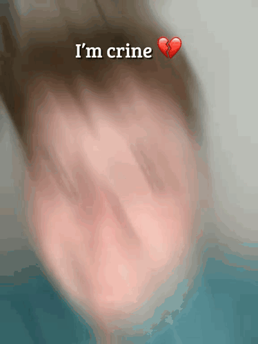 A Blurry Picture Of A Person With The Words I 'M Crine Written On It GIF