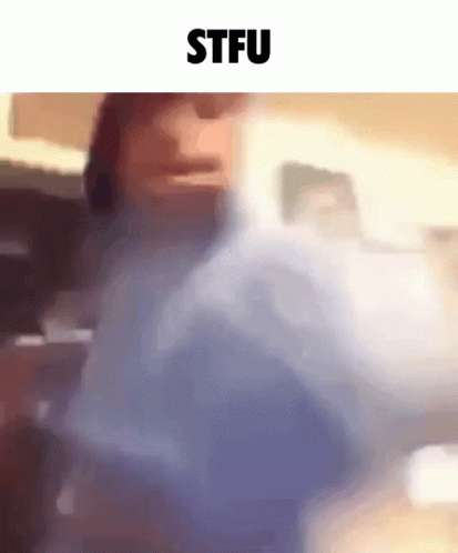A Blurry Picture Of A Person With The Words Stfu On The Top GIF