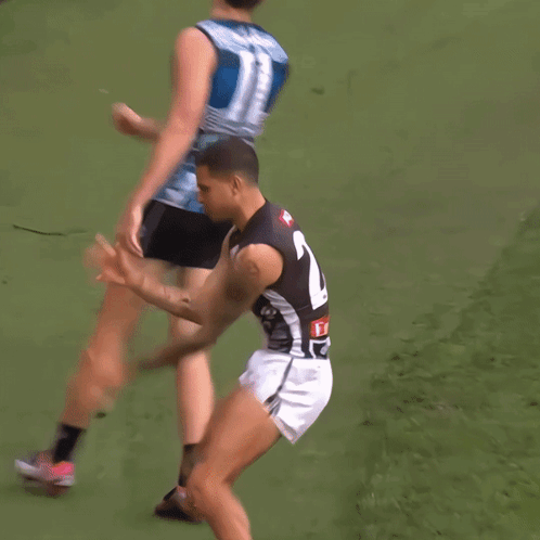 A Blurry Picture Of A Player Wearing A Number 23 Jersey GIF