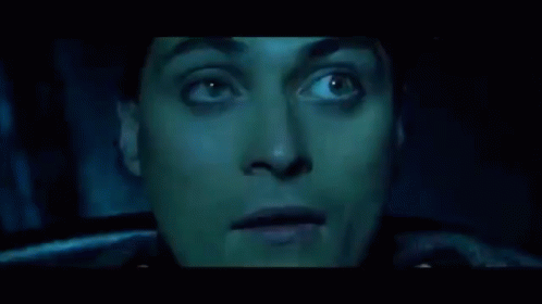 A Blurry Picture Of A Room With A Person Standing In The Background GIF