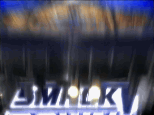 A Blurry Picture Of A Sign That Says Smack Down GIF