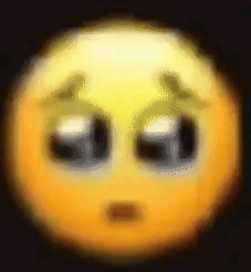 A Blurry Picture Of A Smiley Face With A Sad Look On It . GIF