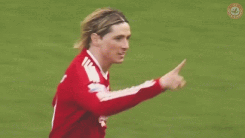 A Blurry Picture Of A Soccer Player Wearing A Headband . GIF