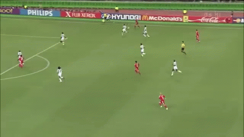 A Blurry Picture Of A Soccer Player With The Letters Ps Hi On The Bottom Left GIF