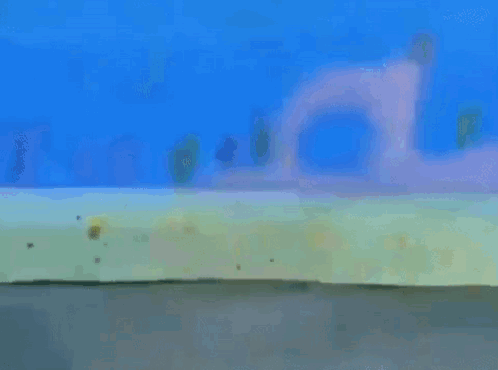 A Blurry Picture Of A Spongebob Squarepants Character With A Surprised Look On His Face GIF