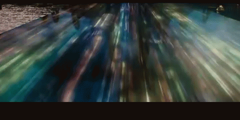 Blurry Train Moving Down Tracks GIF