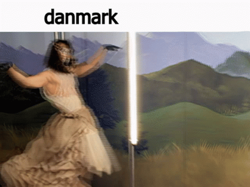 A Blurry Picture Of A Woman In A White Dress With The Word Danmark Above Her GIF