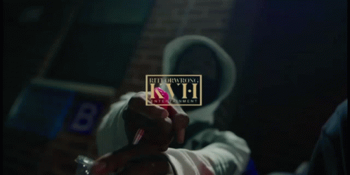 A Blurry Picture Of A Woman 'S Face With The Words International Kaff Entertainment Written On It GIF