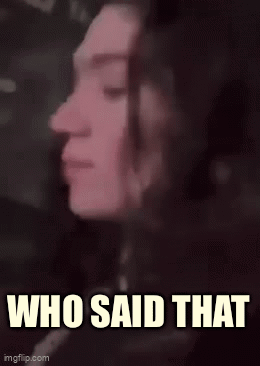 A Blurry Picture Of A Woman 'S Face With The Words `` Who Said That '' Below It . GIF