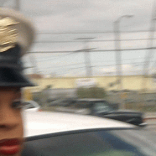 Blurry Woman Wearing Hat And Red Lips GIF