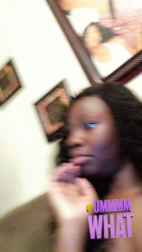 A Blurry Picture Of A Woman With The Words Ummm What Written On The Bottom GIF
