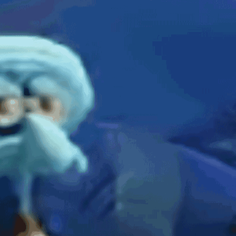 A Blurry Picture Of Squidward From Spongebob Squarepants With Glasses On GIF