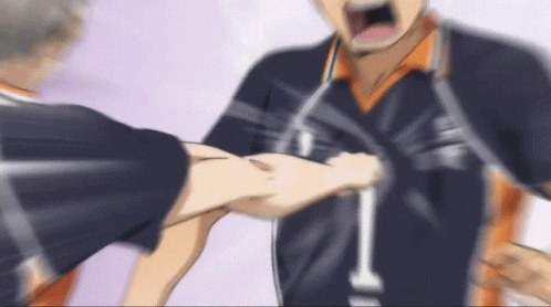 A Blurry Picture Of Two Volleyball Players Fighting Each Other In A Game . GIF
