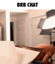 A Blurry Picture With The Words Brb Chat On The Bottom GIF