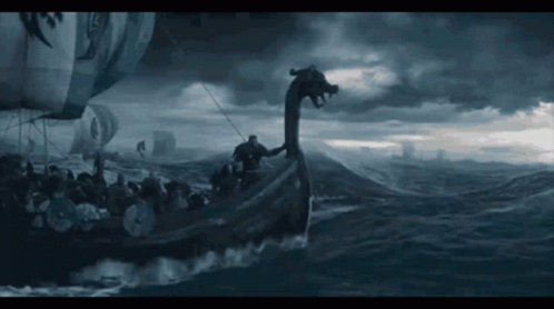 A Boat With A Dragon 'S Head On The Back Of It GIF