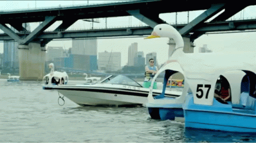 A Boat With The Number 57 On The Side GIF