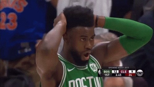 A Boston Celtics Player Holds His Head In His Hands GIF