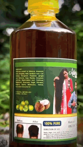 A Bottle Of 100 % Pure Hair Oil Has A Before And After Picture On The Label GIF