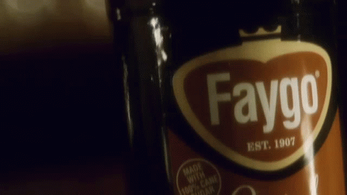 A Bottle Of Faygo Is Being Held By A Person GIF