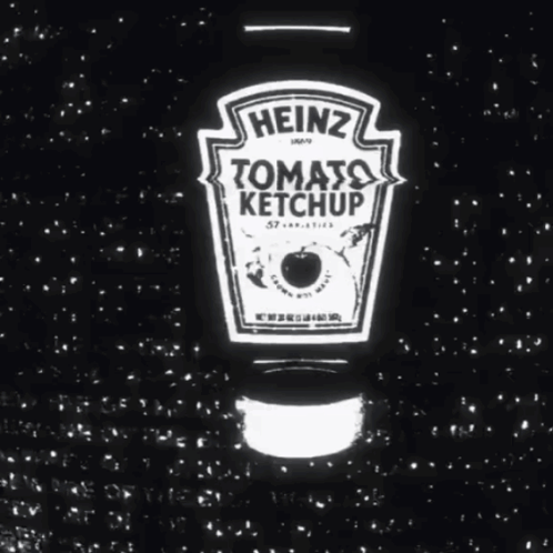 A Bottle Of Heinz Tomato Ketchup Is Surrounded By Stars GIF