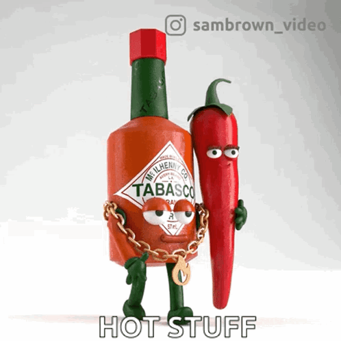 A Bottle Of Tabasco Is Chained To A Pepper GIF