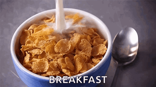 A Bowl Of Cereal With The Word Breakfast Written Above It GIF