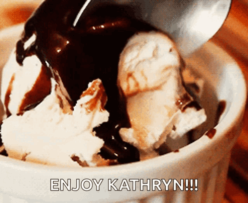 A Bowl Of Ice Cream With Chocolate Sauce And The Words Enjoy Kathryn Written On The Bottom GIF