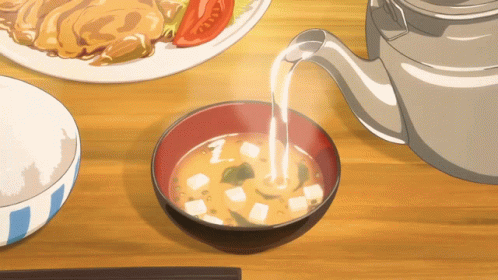 A Bowl Of Soup Next To A Bowl Of Rice GIF