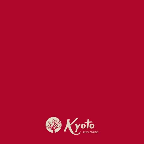 A Bowl Of Yakisoba Noodles With Shrimp And Vegetables On A Red Background GIF