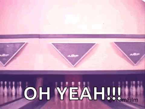 A Bowling Alley With The Words `` Oh Yeah ! '' Written On It . GIF