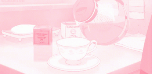 A Box Of Buckmore Tea Sits Next To A Cup GIF