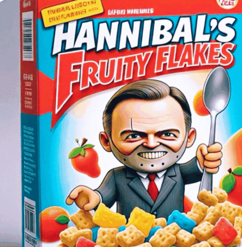 A Box Of Hannibal 'S Fruity Flakes Cereal Shows A Man In A Suit And Tie Holding A Spoon GIF