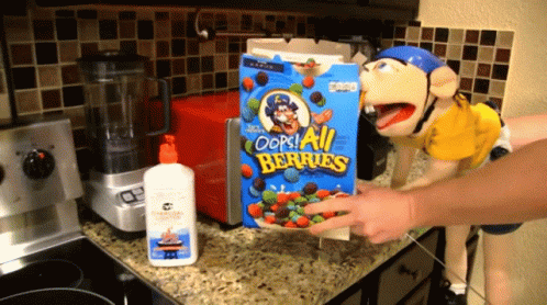 a box of oops all berries cereal is on a counter