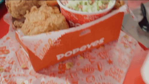 A Box Of Popeye 'S Fried Chicken And Coleslaw GIF