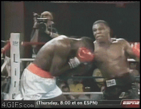 A Boxing Match Is Being Shown On Espn At 8:00 GIF