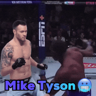 A Boxing Match With The Name Mike Tyson On The Screen GIF