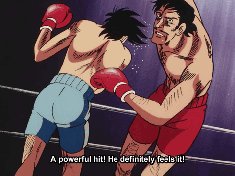 A Boxing Match With The Words " A Powerful Hit He Definitely Feels It " In The Corner GIF