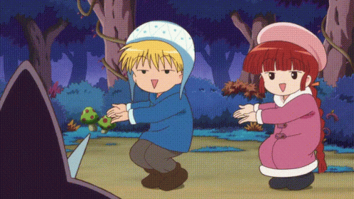 A Boy And A Girl Are Dancing In A Cartoon GIF