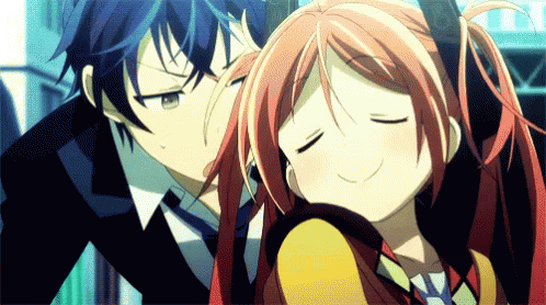A Boy And A Girl Are Hugging Each Other And The Girl Is Smiling GIF