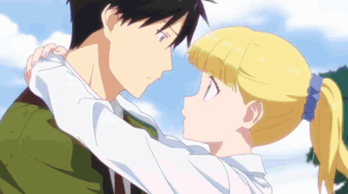 A Boy And A Girl Are Hugging Each Other With Their Eyes Closed GIF