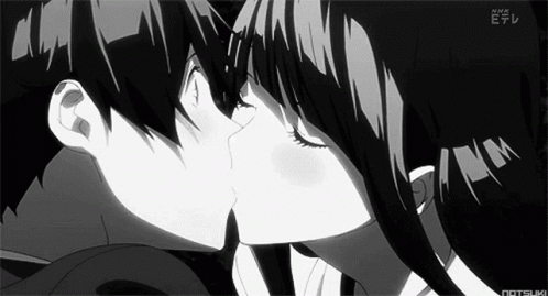 A Boy And A Girl Are Kissing In A Black And White Anime . GIF