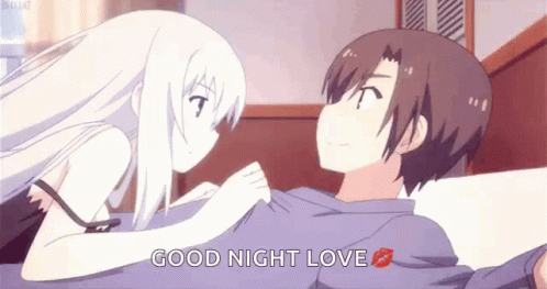 A Boy And A Girl Are Kissing On A Bed With The Words `` Good Night Love '' . GIF