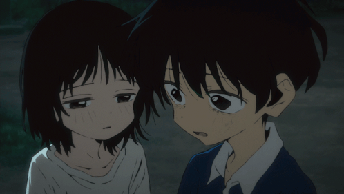 A Boy And A Girl Are Looking At Each Other GIF