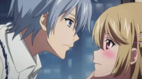A Boy And A Girl Are Looking At Each Other And Kissing GIF