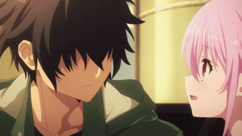 A Boy And A Girl Are Looking At Each Other And The Girl Has Pink Hair GIF