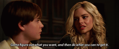 A Boy And A Girl Are Looking At Each Other And The Girl Says Gotta Figure Out What You Want GIF