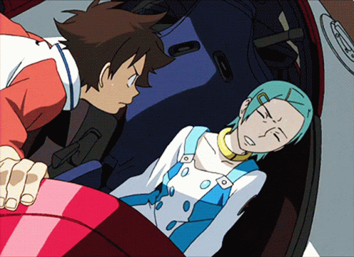A Boy And A Girl Are Looking At Each Other In A Car GIF