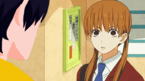 A Boy And A Girl Are Looking At Each Other In A Cartoon GIF