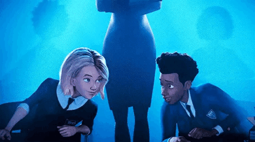 A Boy And A Girl Are Sitting Next To Each Other In A Classroom . GIF