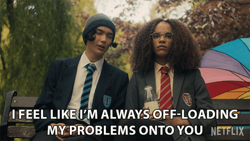 Boy And Girl Sitting On Bench With Netflix Ad GIF